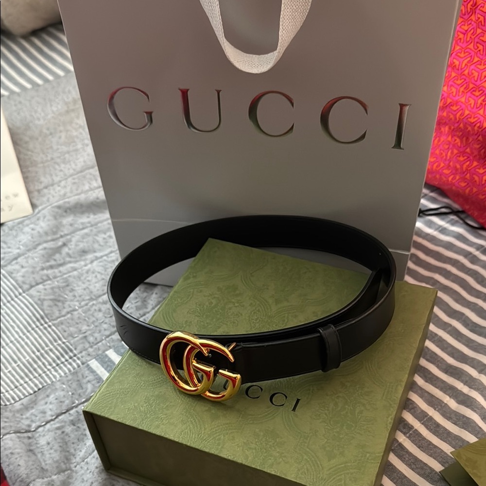 Gucci Black and Gold Leather Belt with Iconic GG Buckle